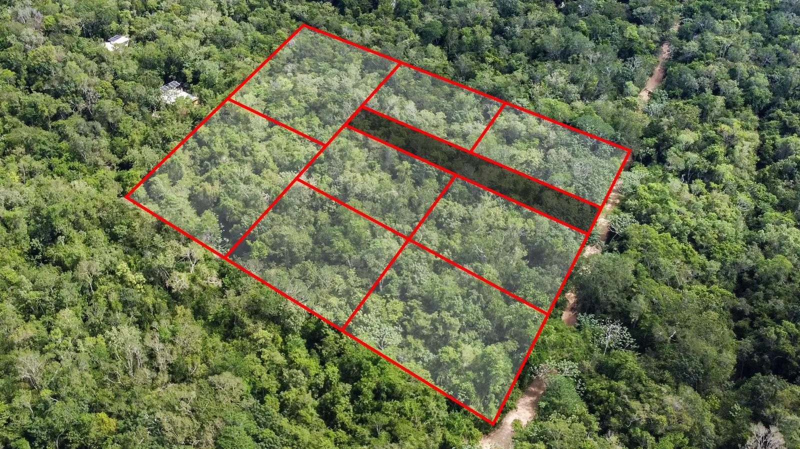 Drone view of the parcel with an illustrative layout of individual lots and an internal access strip outlined in red